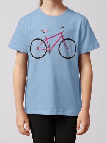 watabout.kids Shirt 'Pink Bike' in Blue: front