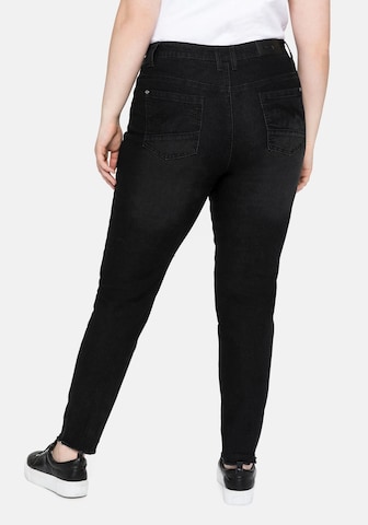 SHEEGO Skinny Jeans in Schwarz