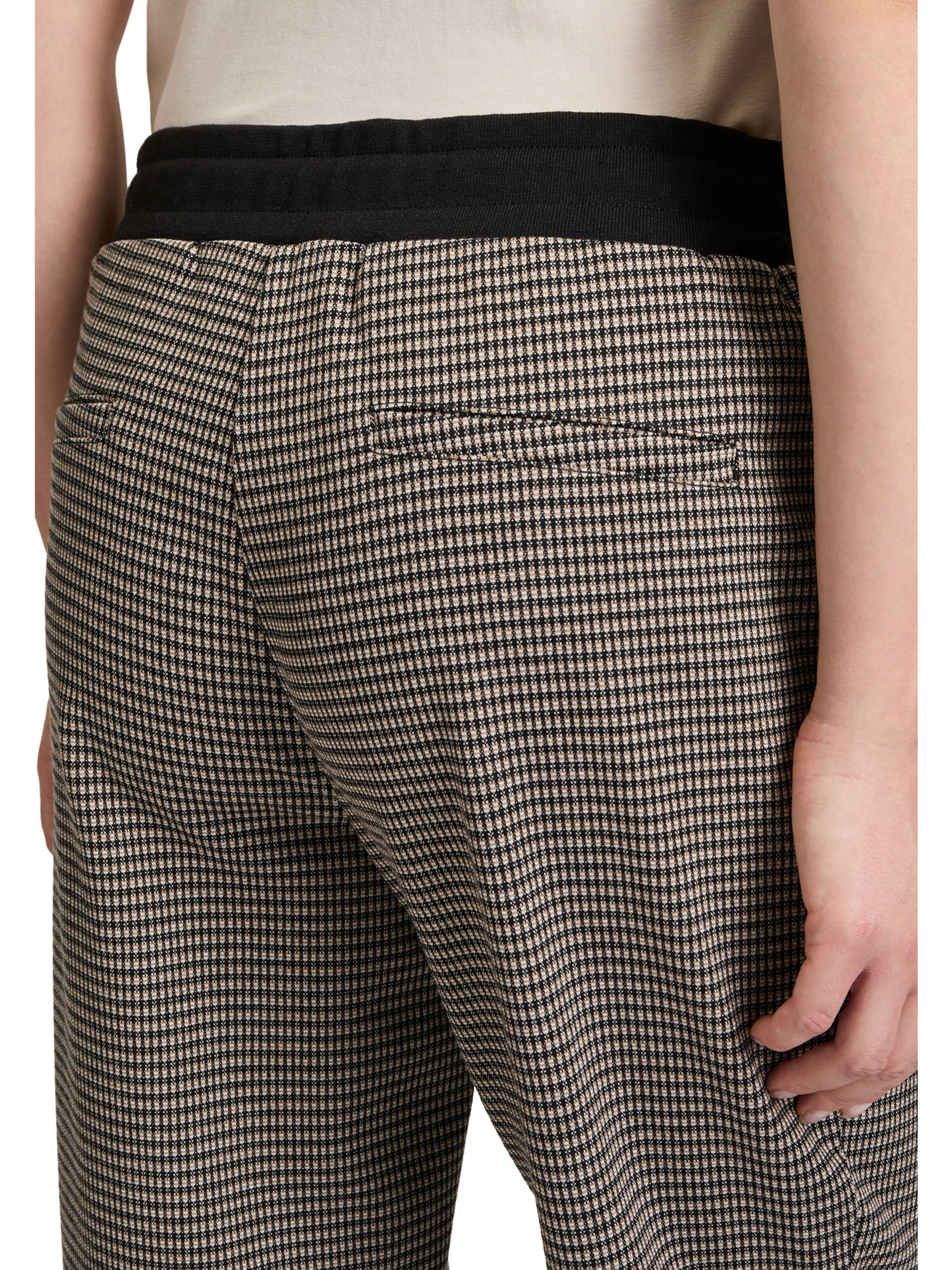 Betty & Co Loosefit Schlupfhose mit Reißverschlusstaschen in Schwarz