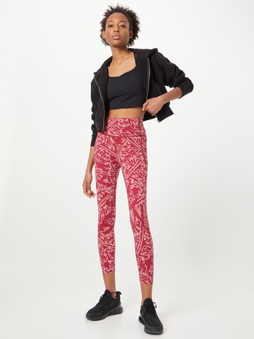 UNDER ARMOUR Skinny Sportsbukse 'Meridian' i rosa