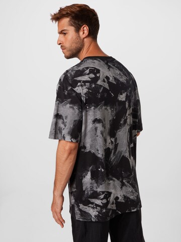 T-Shirt fonctionnel Reebok en noir