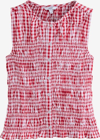 Next Pusero värissä punainen: etupuoli