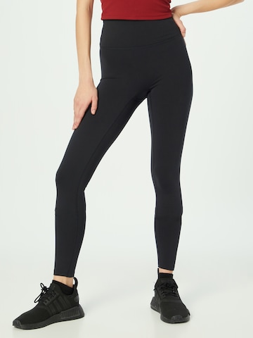 Girlfriend Collective Skinny Workout Pants 'LUXE' in Black: front