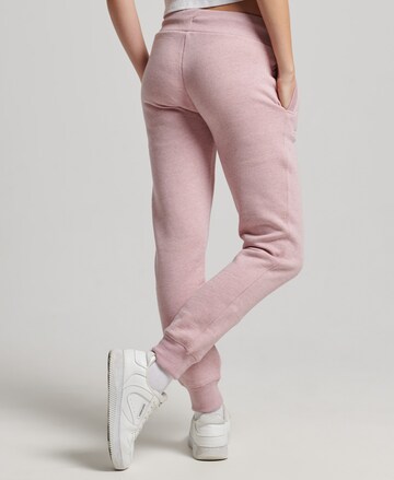 Tapered Pantaloni de la Superdry pe roz