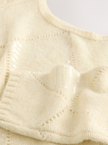 Next Neulepaita värissä beige