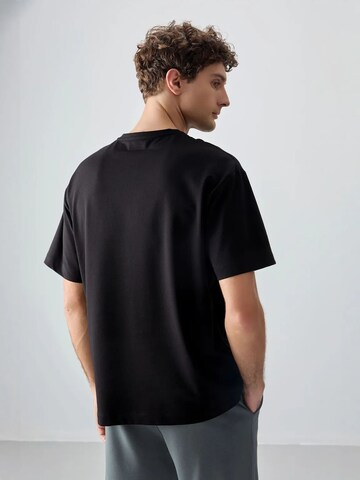 Tommy Life T-Shirts in Schwarz