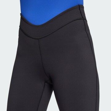 évasé Pantalon de sport ADIDAS PERFORMANCE en noir