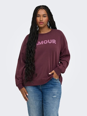 Sweat-shirt 'CAREmelie' ONLY Carmakoma en rouge : devant