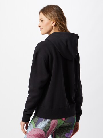 Nike SportswearSweater majica 'W NSW HOODIE FLC TREND 2' - crna boja