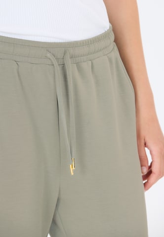 Athlecia Tapered Sportbroek 'Jacey' in Groen