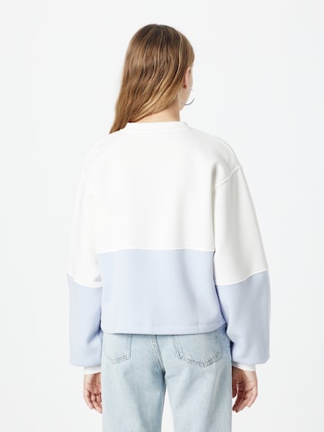 Sweat-shirt Gina Tricot en bleu