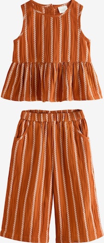 Next Setti värissä oranssi: etupuoli