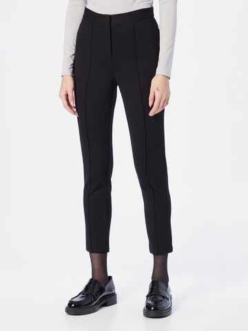 Skinny Pantaloni de la DKNY pe negru: față