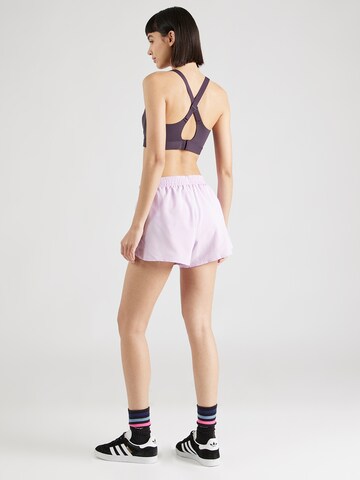 UNDER ARMOUR Normalny krój Spodnie sportowe 'Fly By 3' w kolorze fioletowy