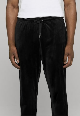 ROCAWEAR Zwężany krój Spodnie 'Austin' w kolorze czarny