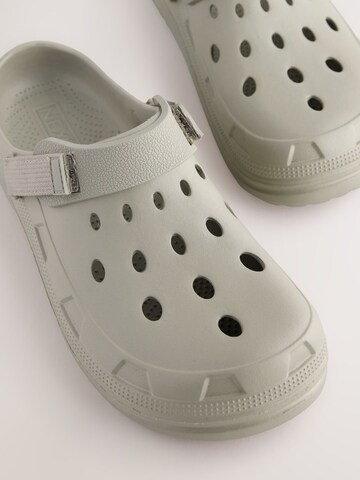 Next Puukengät & Crocs-jalkineet värissä beige