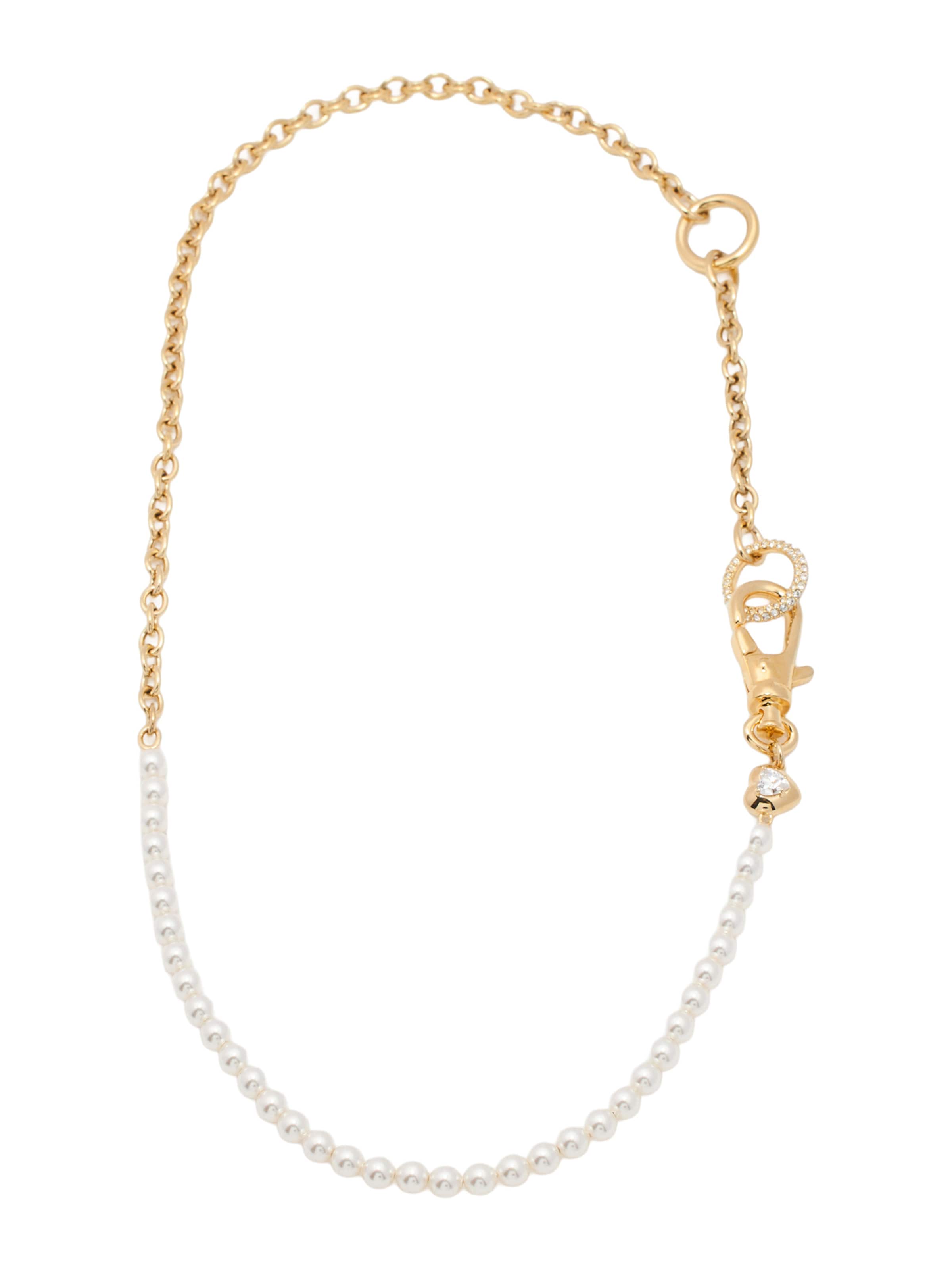 Swarovski - Cadena en oro: frente