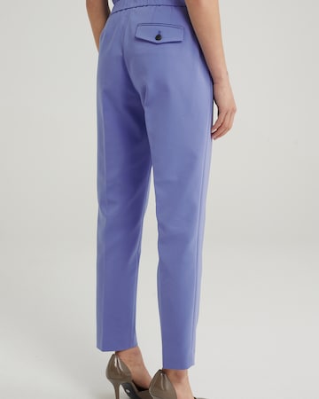 Regular Pantalon à plis WE Fashion en violet