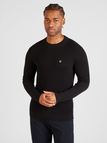 Pull-over Calvin Klein Jeans en noir : devant