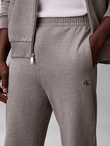 Calvin Klein Jeans Tapered Trousers 'Terry' in Grey
