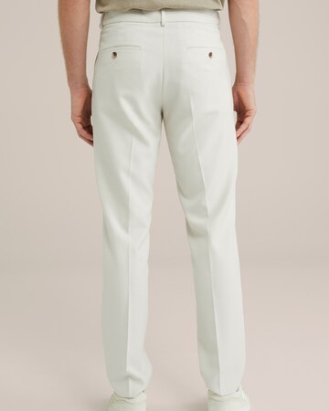 Slimfit Pantaloni con piega frontale di WE Fashion in beige