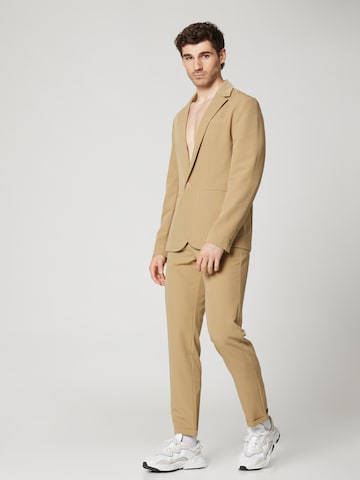 ABOUT YOU x Kevin Trapp Tapered Pleat-Front Pants 'Emil' in Brown