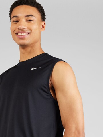 NIKE - Camiseta funcional en negro