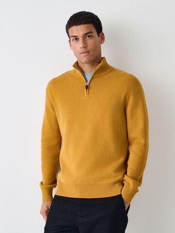 Next Svetr – žlutá: přední strana