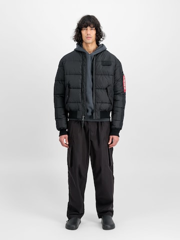 ALPHA INDUSTRIES Between-Season Jacket 'MA-1 Puffer' in Black
