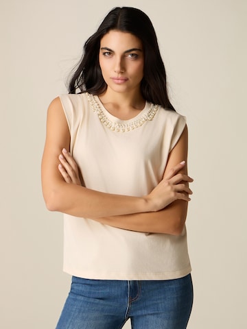 Haut oltre en beige