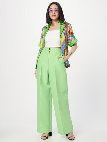 Essentiel Antwerp Wide leg Pleat-front trousers in Green