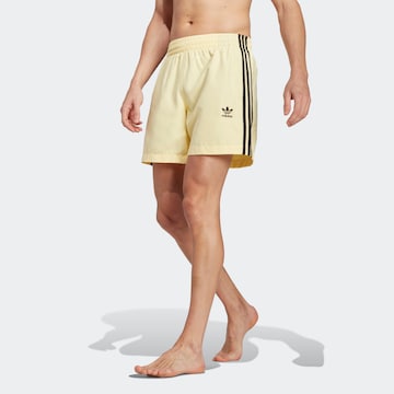 ADIDAS ORIGINALS Board Shorts 'Adicolor 3-Stripes' in Yellow: front