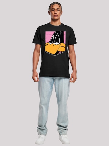 F4NT4STIC Shirt 'Looney Tunes Daffy Duck Face Faux Pocket' in Black | ABOUT  YOU