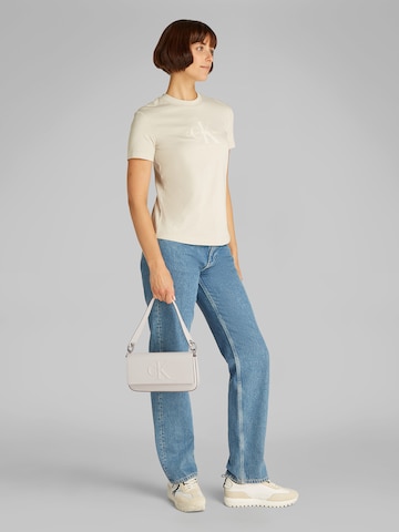 Calvin Klein Jeans Torba na ramię w kolorze beżowy