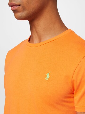 Tricou de la Polo Ralph Lauren pe portocaliu