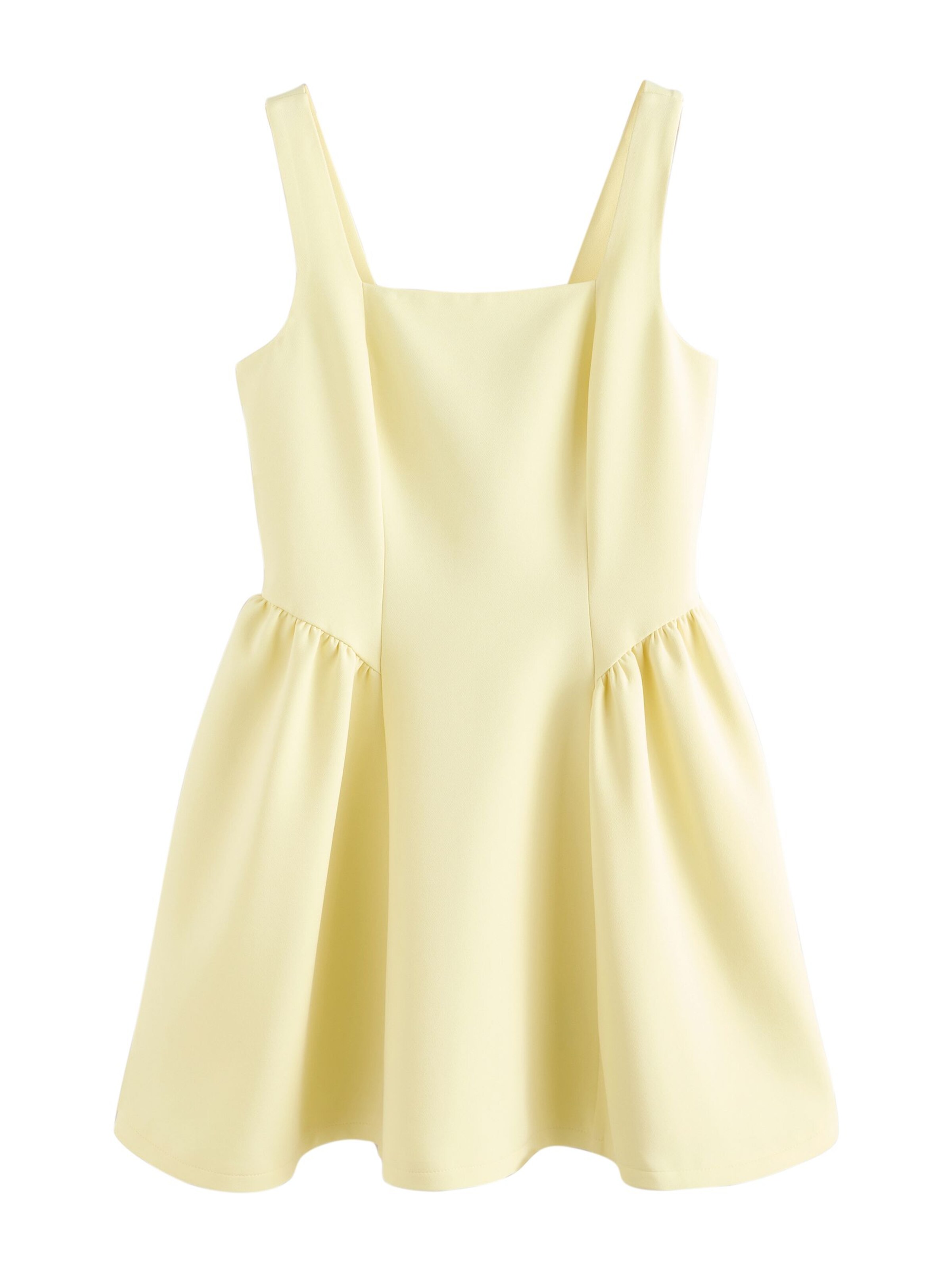 Next Mekko värissä keltainen: etupuoli