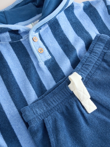 Set Next en bleu