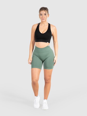 Skinny Pantalon de sport Smilodox en vert