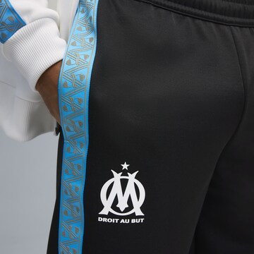 PUMA Tapered Sportbroek 'Olympique de Marseille King Anthem' in Zwart