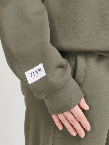 ABOUT YOU x VIAM Studio Sweatshirt 'Motivation' in Green