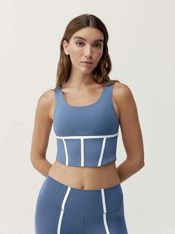 Born Living Yoga Sporttop 'Vani' in Blauw: voorkant