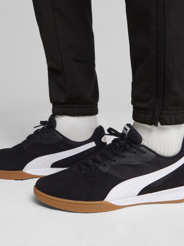 Ghete de fotbal 'King Top' de la PUMA pe negru: față