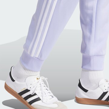ADIDAS ORIGINALS Конический (Tapered) Штаны 'Adicolor Classics' в Лиловый