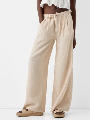 Bershka Wide leg Byxa i beige