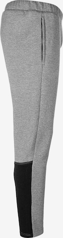 Effilé Pantalon de sport 'Team Cup' PUMA en gris