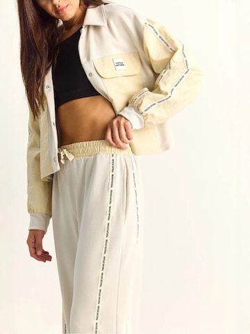Pantalons de tailleur Bianco Lucci en beige