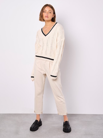 Pull-over ' ' Apricot en gris