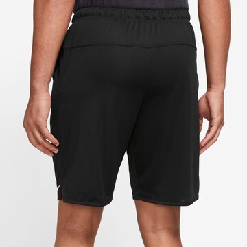 NIKE Regular Workout Pants 'Totality' in Black