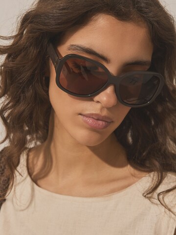 Lunettes de soleil Next en marron : devant