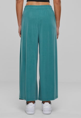 Wide leg Pantaloni di Urban Classics in verde